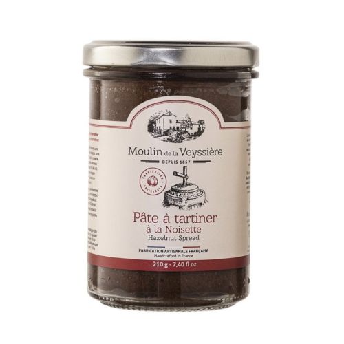 A jar of "Pâte à tartiner à la Noisette," hazelnut spread by Moulin de la Veyssière, 7.74 fl oz, with a vintage-styled label.